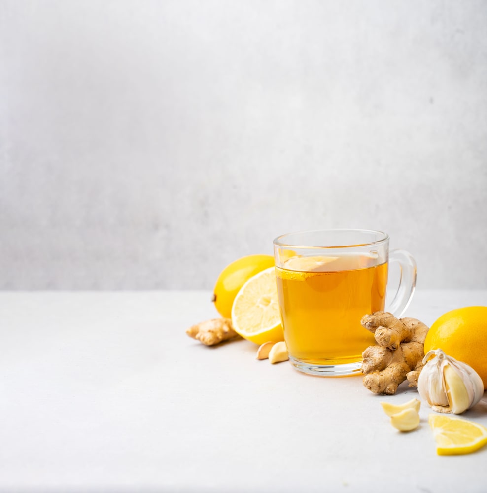 Imbiero arbata su citrina puodelyje