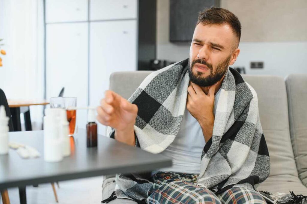 Skauda ryti kai vyras jaučia skausmą gerklėje ir sunkiai ryja