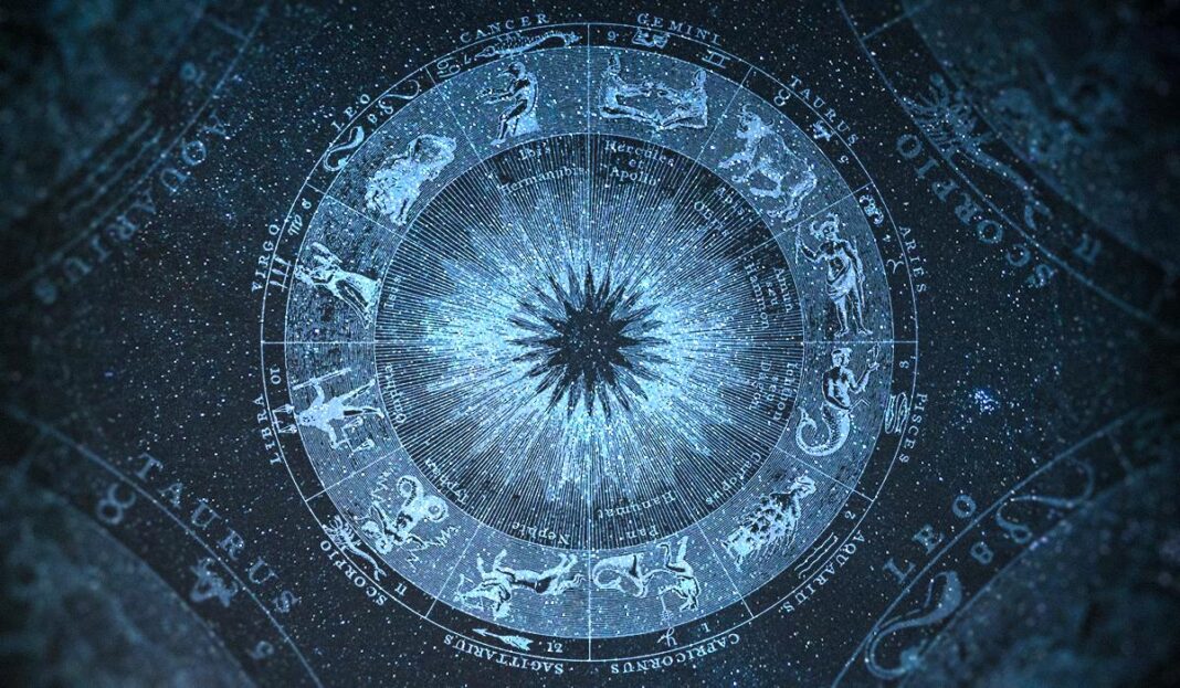 Mėlyname fone pavaizduotas švytintis Zodiako ženklų ratas